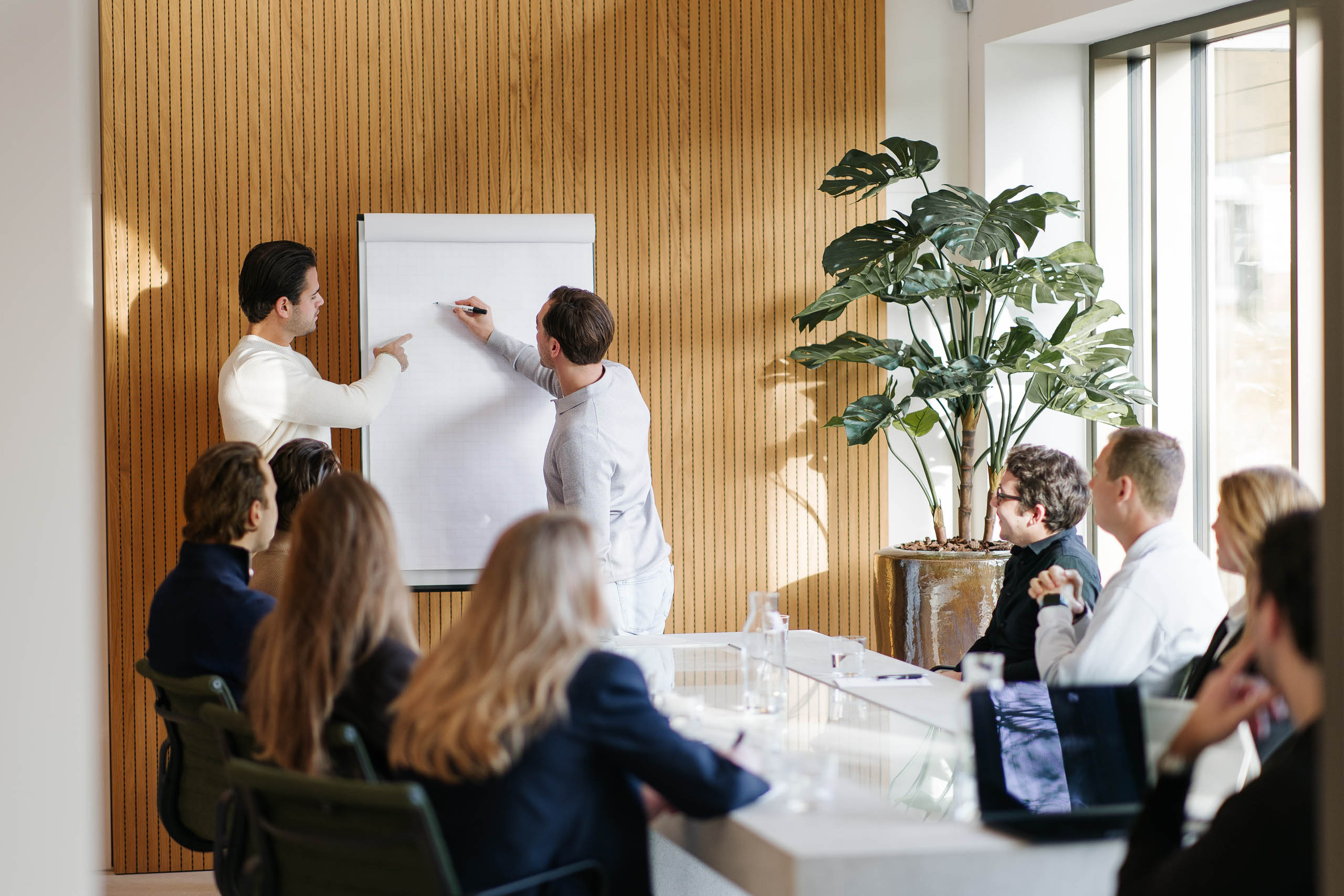 Team van LUCRATIEF tijdens een workshop en presentatie